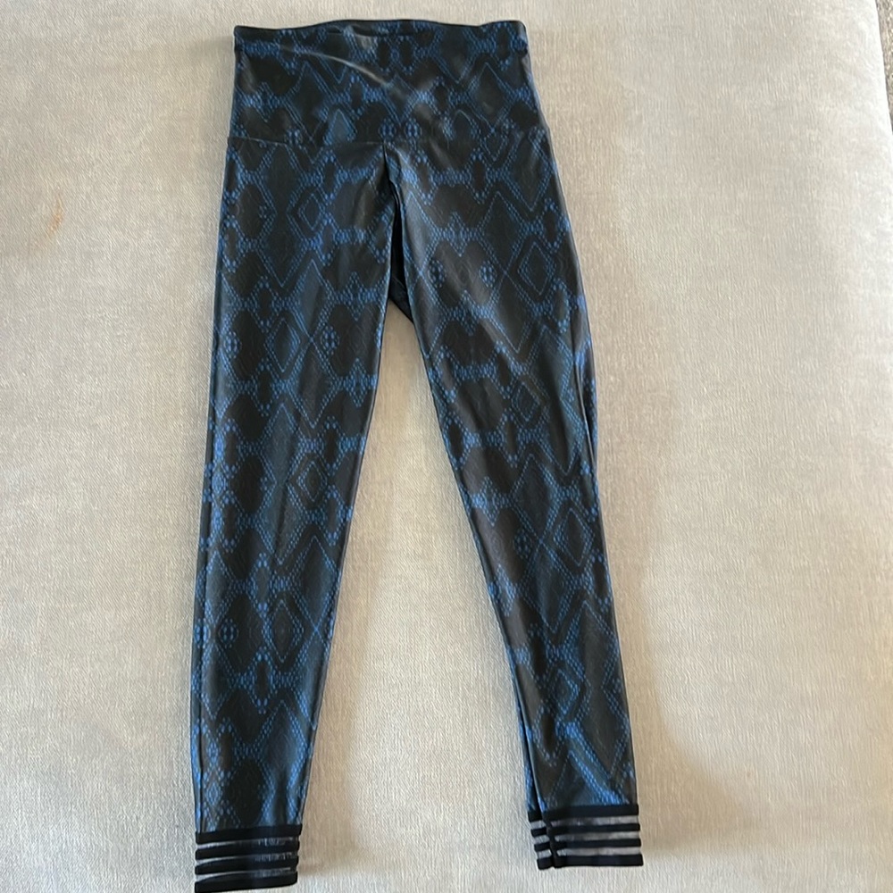 Multi color Onzie legging , Size small , brand new, never worn, without tags